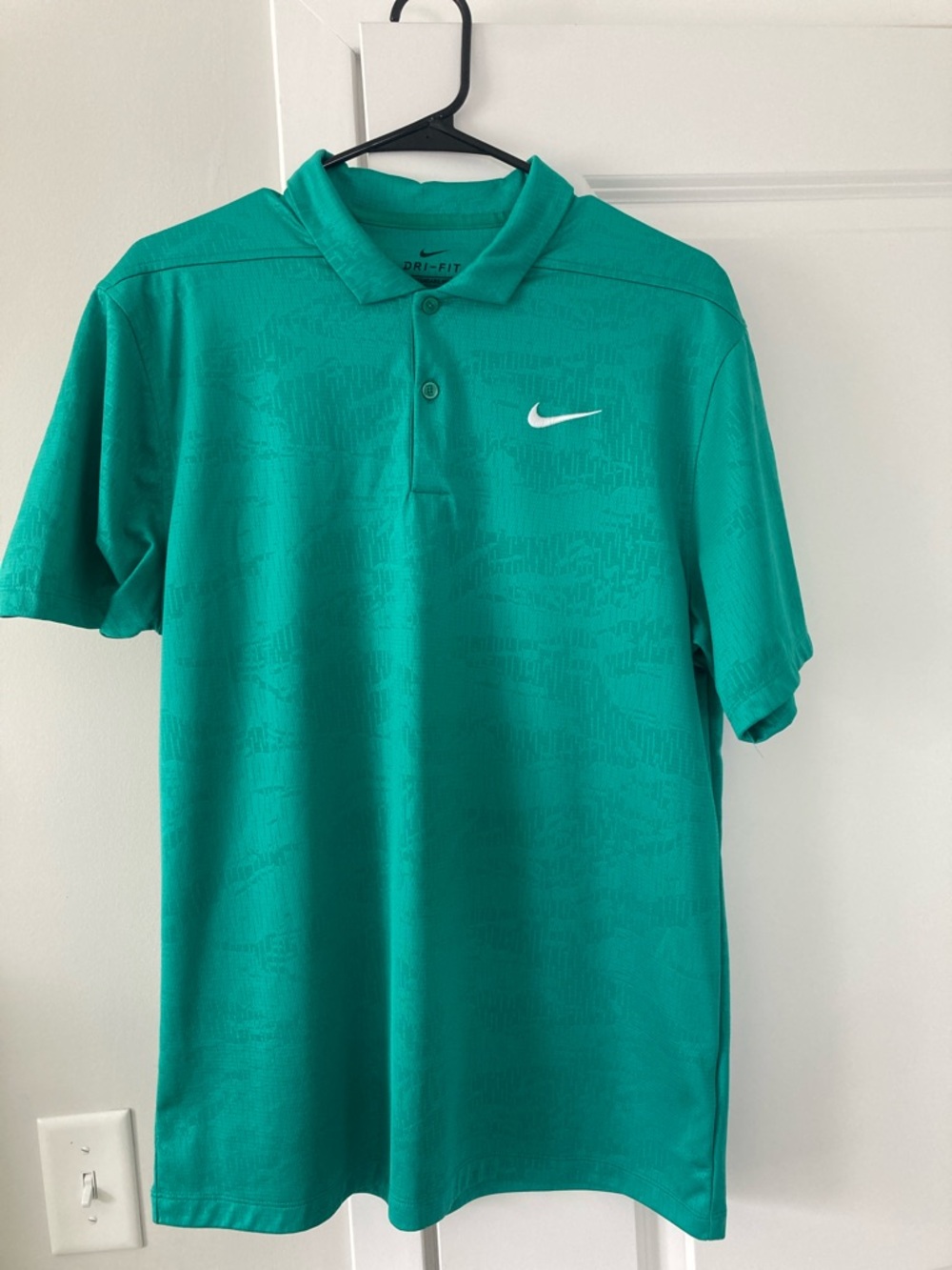Nike Men’s Teal Polo with White Swoosh